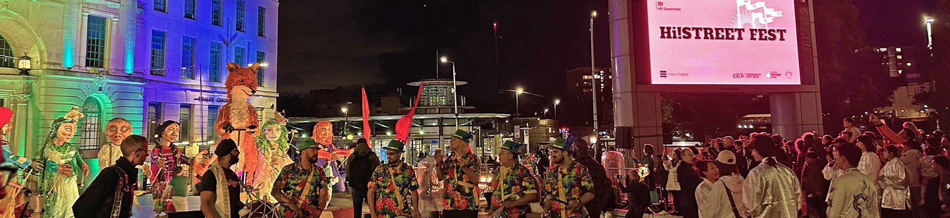 A photograph of a colourful musical parade. 